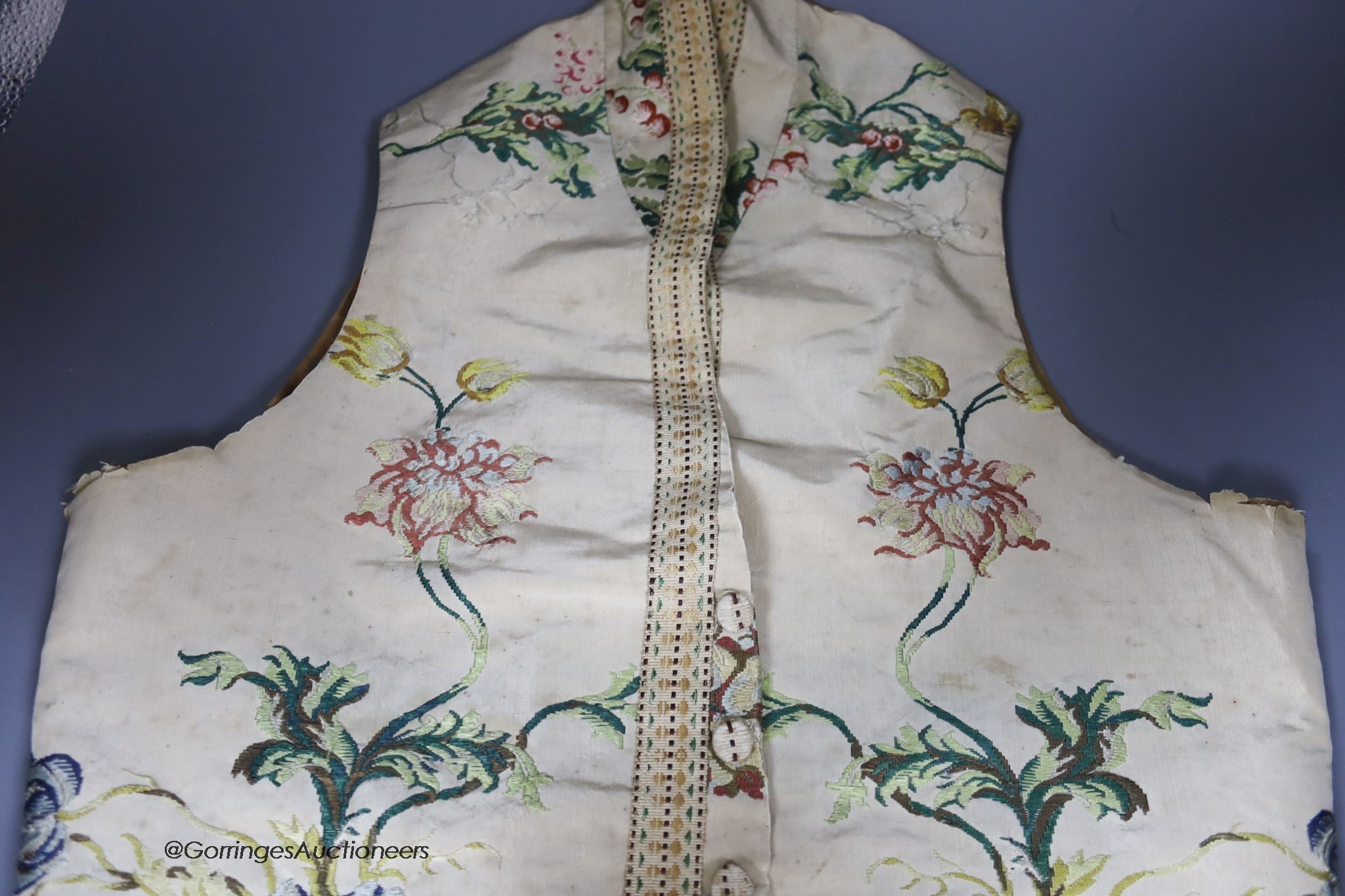 A late 18th century brocade child's waistcoat